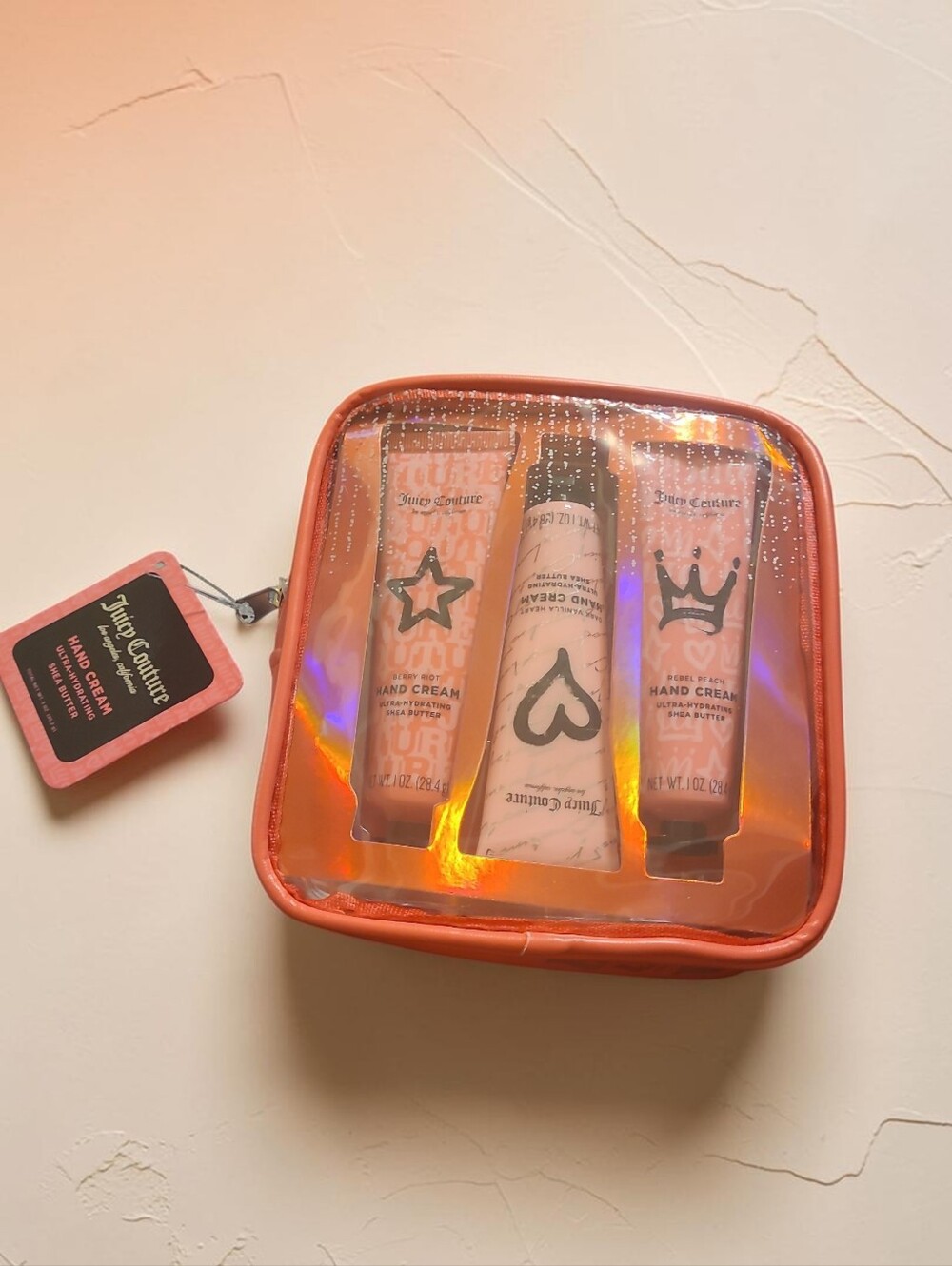 Juicy Couture Pink and Holographic Hand Cream Trio with Iridescent Pouch